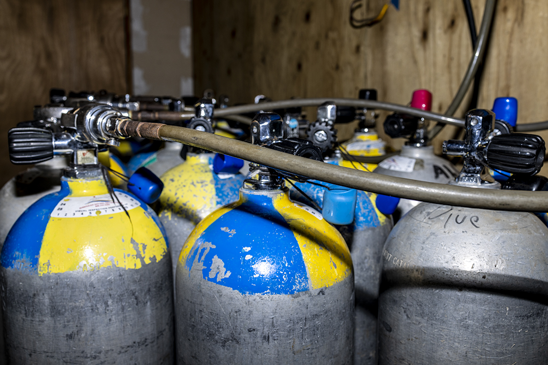 scuba tanks being filled